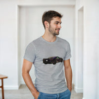 Load image into Gallery viewer, Man wearing a gray t-shirt with a car graphic in a minimalistic room.
