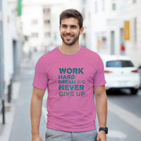 Load image into Gallery viewer, Man wearing a pink t-shirt with motivational text on a city street
