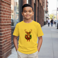 Load image into Gallery viewer, Child wearing a yellow t-shirt with a reindeer design on a city street.
