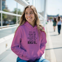 Load image into Gallery viewer, Person wearing a purple hoodie with text, sitting outdoors on a sunny day.
