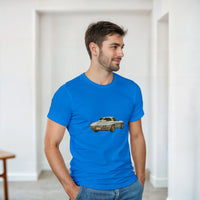 Load image into Gallery viewer, Man wearing a blue t-shirt with a car graphic in a minimal indoor setting
