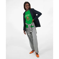 Load image into Gallery viewer, Person wearing a green graphic t-shirt, gray pants, and an navy blazer on a white background
