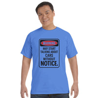 Load image into Gallery viewer, Man wearing a blue t-shirt with a humorous warning design on a white background
