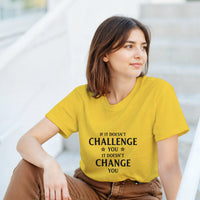 Load image into Gallery viewer, Woman wearing a yellow t-shirt with a motivational quote, sitting on steps.

