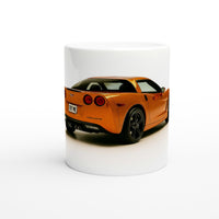 Load image into Gallery viewer, White mug with an orange sports car design on a white background
