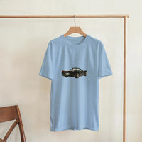 Load image into Gallery viewer, Light blue t-shirt with a black car graphic on a wooden hanger against a beige wall.
