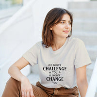 Load image into Gallery viewer, Woman wearing a t-shirt with a motivational quote sitting outdoors.
