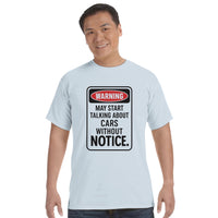 Load image into Gallery viewer, Man wearing a light blue t-shirt with a humorous warning sign design on a white background
