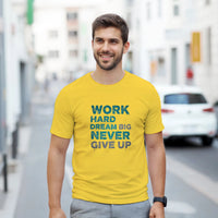Load image into Gallery viewer, Man wearing a yellow t-shirt with motivational text on a city street
