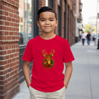 Load image into Gallery viewer, Child wearing a red t-shirt with a reindeer design on a city street.
