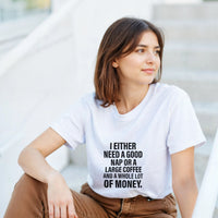 Load image into Gallery viewer, Woman wearing a white t-shirt with a humorous text design, sitting outdoors.
