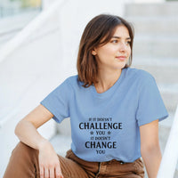 Load image into Gallery viewer, Woman wearing a light blue t-shirt with a motivational quote, sitting outdoors.
