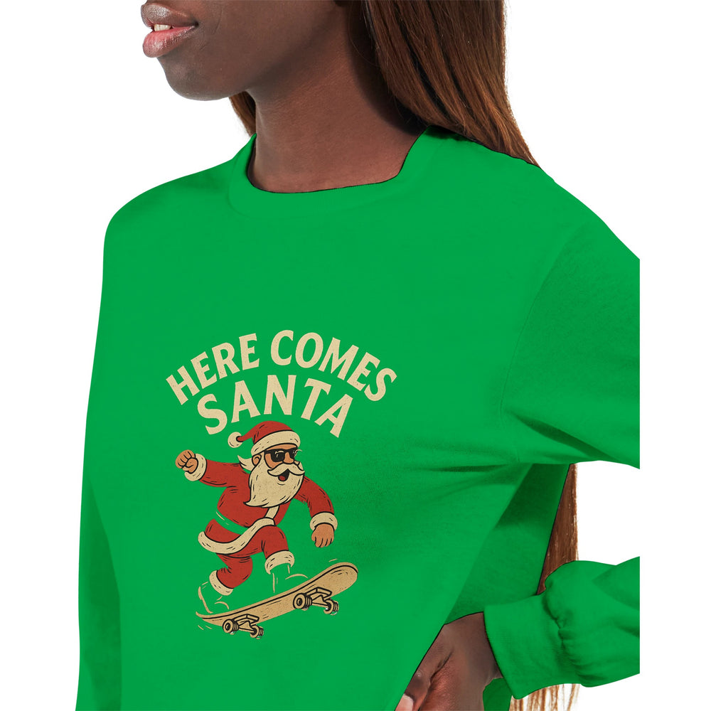 Green sweatshirt with 'Here Comes Santa' graphic featuring a skater Santa Claus.