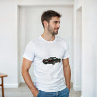 Load image into Gallery viewer, Man wearing a white t-shirt with a car graphic, standing in a minimalistic room.
