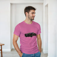 Load image into Gallery viewer, Man wearing a pink t-shirt with a black car graphic in a minimal indoor setting
