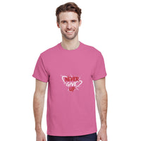 Load image into Gallery viewer, Man wearing a pink t-shirt with &#39;Never Give Up&#39; text on a white background
