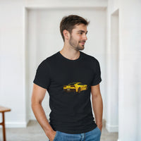 Load image into Gallery viewer, Man wearing a black t-shirt with a yellow car graphic in a minimalistic room.
