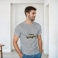 Load image into Gallery viewer, Man wearing a gray t-shirt with a car graphic in a minimalistic room.
