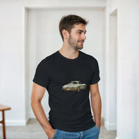 Load image into Gallery viewer, Man wearing a black t-shirt with a car graphic in a minimalistic room.
