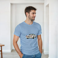 Load image into Gallery viewer, Man wearing a light blue t-shirt with a car graphic in a minimalistic room.
