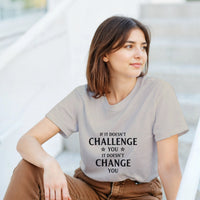 Load image into Gallery viewer, Woman wearing a t-shirt with a motivational quote sitting outdoors.
