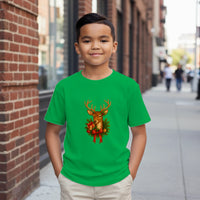 Load image into Gallery viewer, Child wearing a green t-shirt with a reindeer design on a city street.
