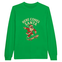 Load image into Gallery viewer, Green long-sleeve shirt with &#39;Here Comes Santa&#39; graphic on a white background
