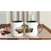 Load image into Gallery viewer, Two white mugs with black interior and handle featuring vintage car design on a checkered tablecloth.
