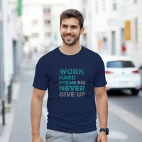 Load image into Gallery viewer, Man wearing a navy blue t-shirt with motivational text on a city street.
