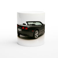Load image into Gallery viewer, Mug with a black Corvette car design on a white background
