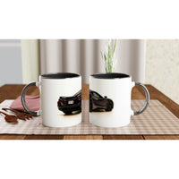 Load image into Gallery viewer, Two white mugs with black interior on a checkered tablecloth, featuring images of cars.
