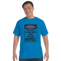 Load image into Gallery viewer, Man wearing a blue t-shirt with a humorous warning design on a white background
